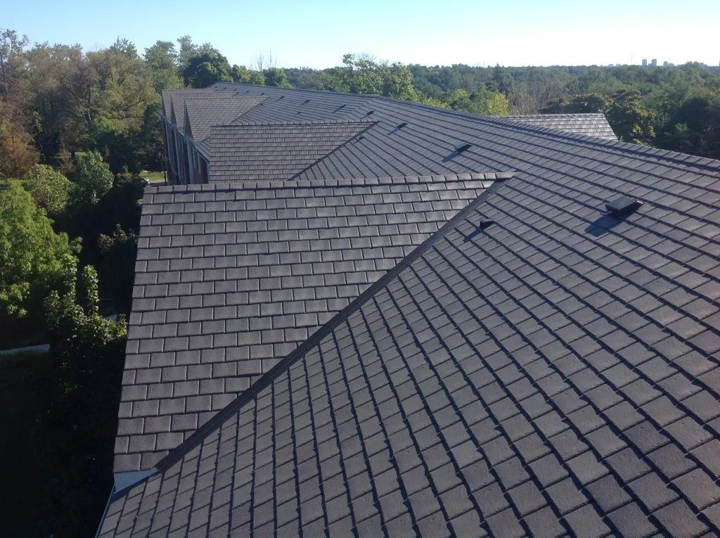 Beautiful natural slate roofing installed on a Tampa Bay area home with rich gray stone texture