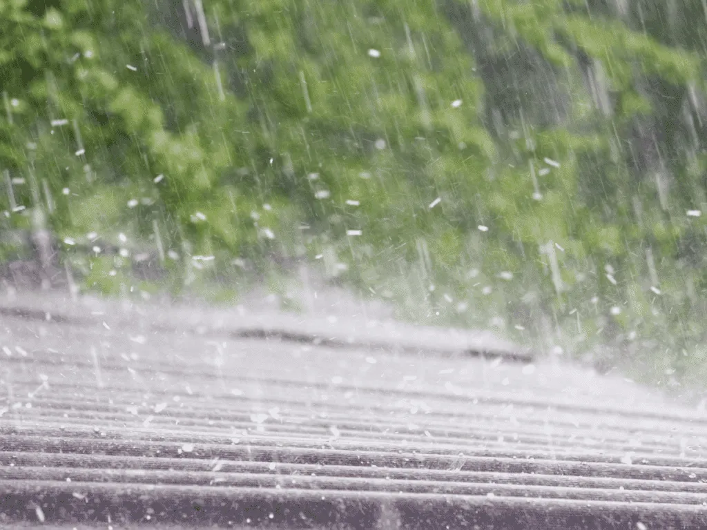Impact resistance test on a Class 4 rated roofing shingle showing hail and debris protection